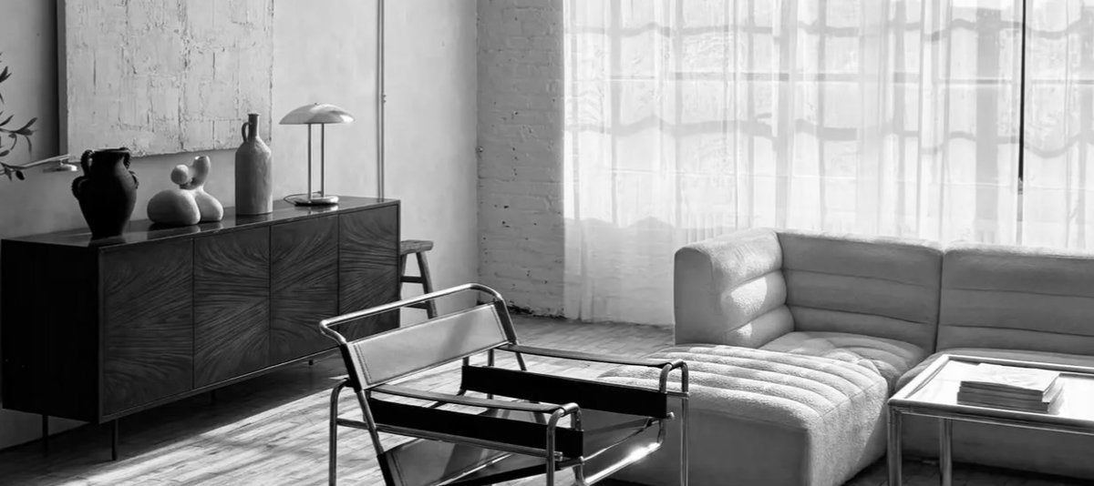 Our private studio with a cabinet, bright curtains and seating.